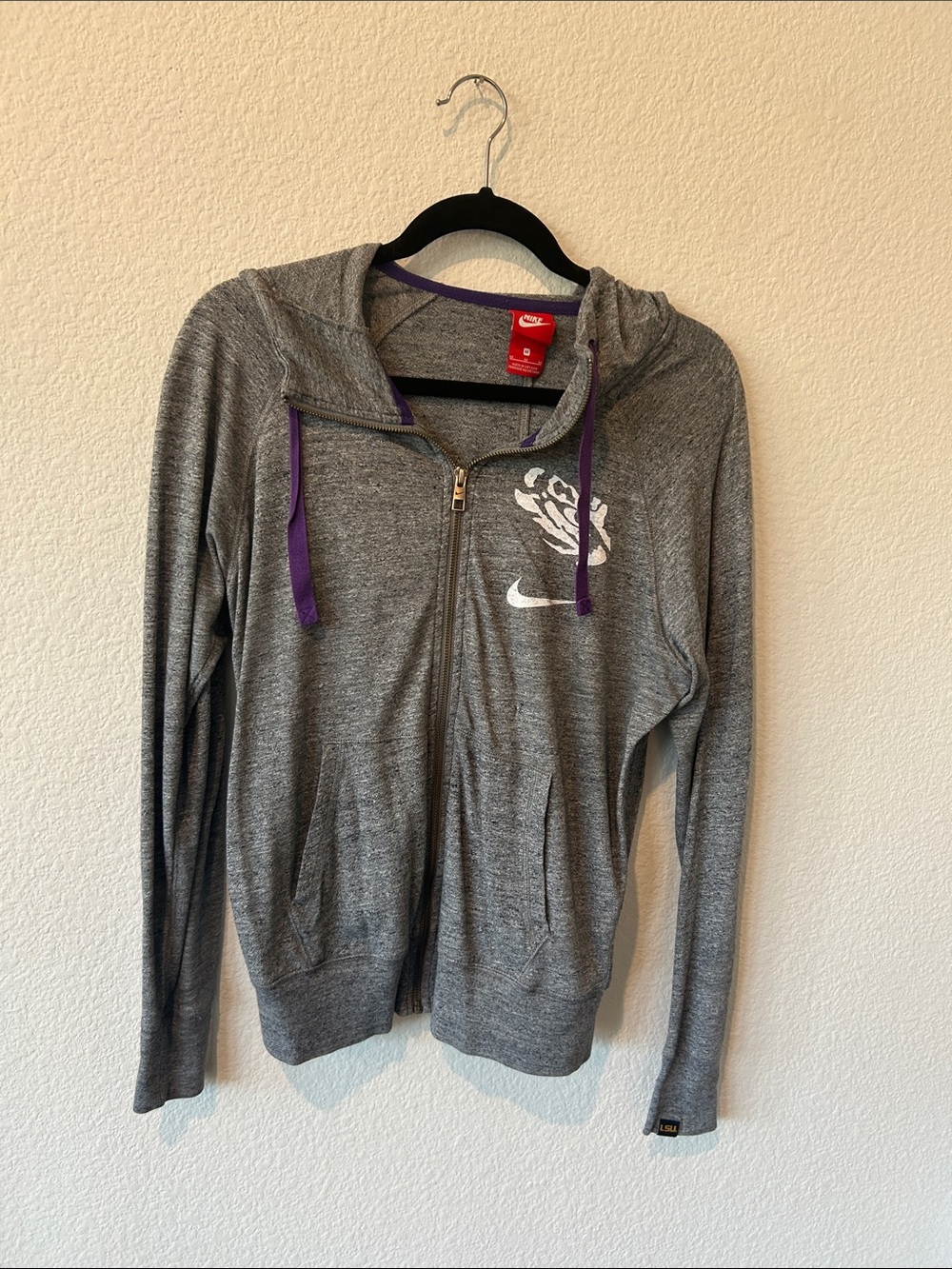 Nike LSU Women’s Gray Zip Hoodie with Purple Drawcords and White Graphic